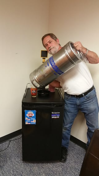 2016-05-06_Kevin_shows_that_we_have_kicked_the_first_keg_of_Sam_Adams_in_the_IMR_kegerator.jpg